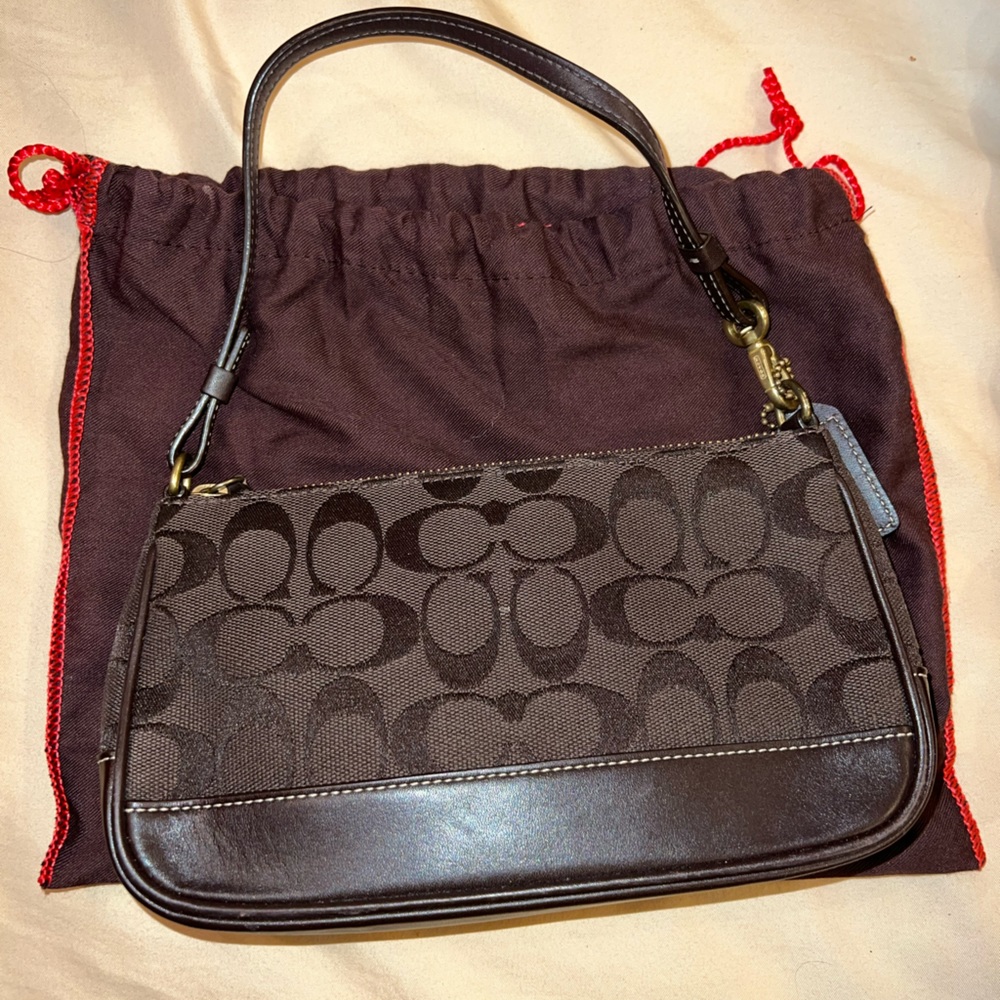 Used coach bag with handle.